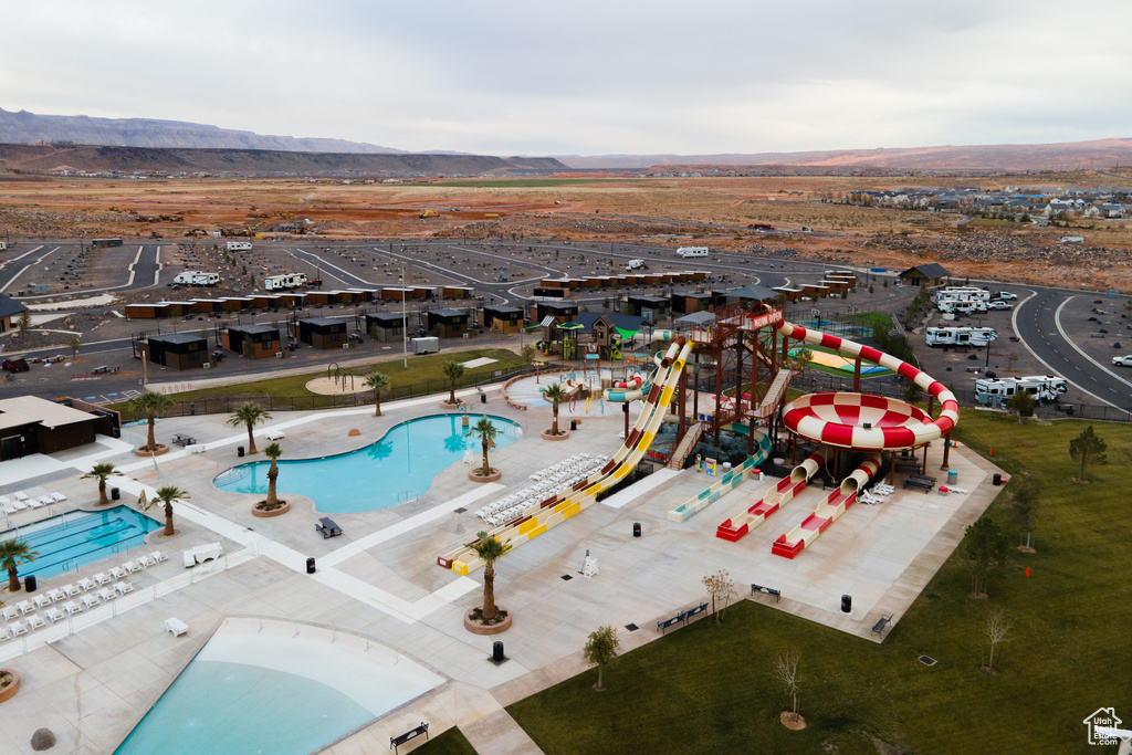 Birds eye view of property featuring a mountain view