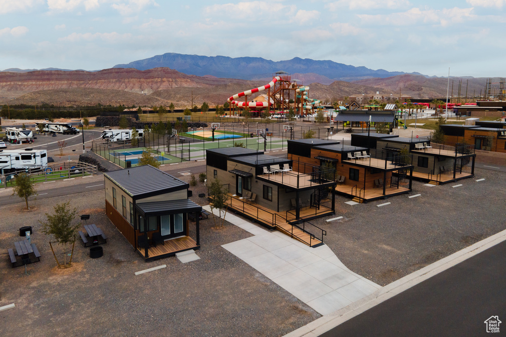 Birds eye view of property featuring a mountain view