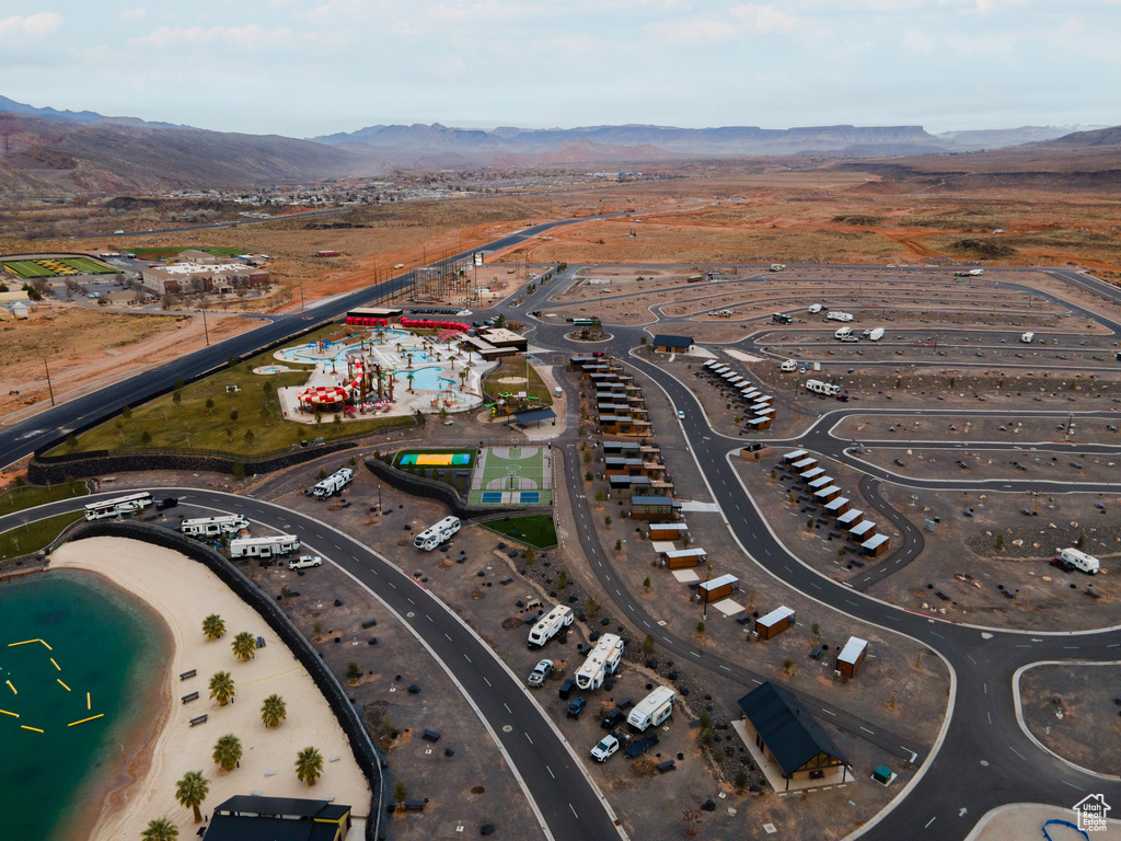 Birds eye view of property featuring a mountain view