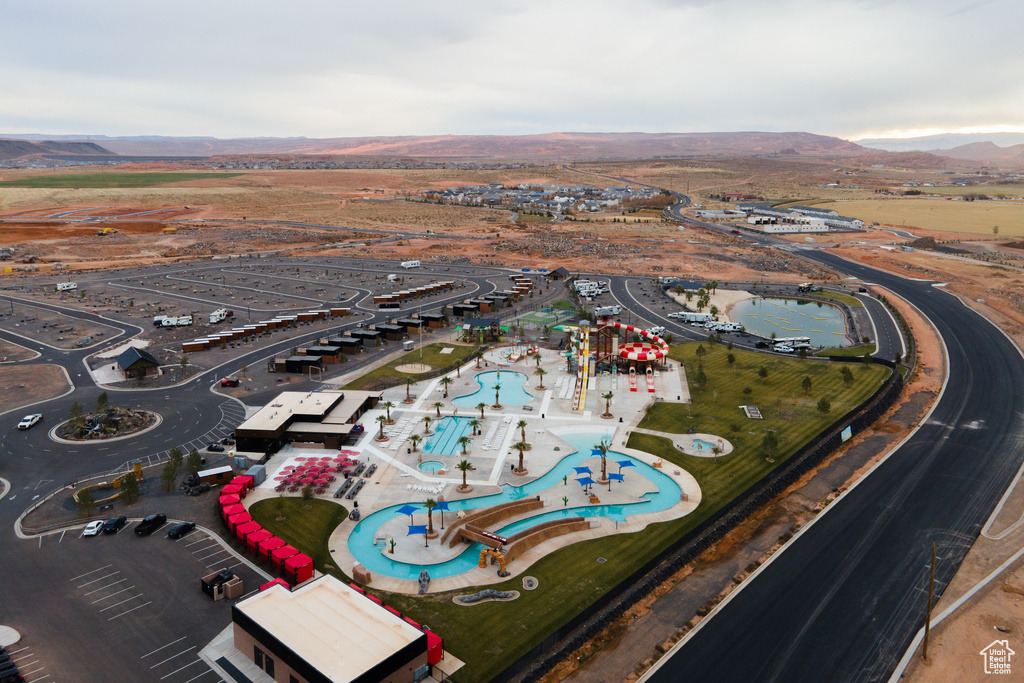 Birds eye view of property with a mountain view