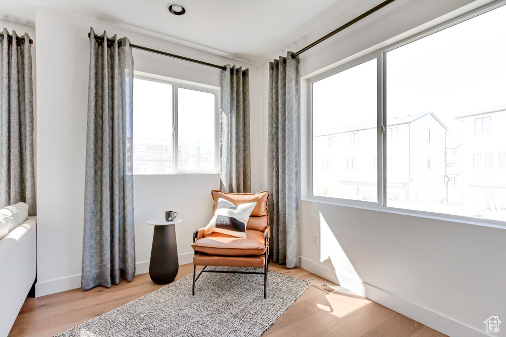 Sitting room featuring light wood-type flooring
