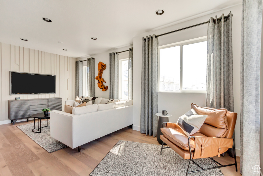 Living room with light wood-type flooring