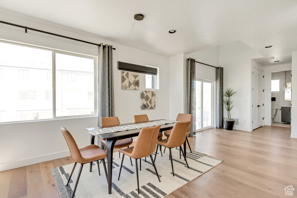 Dining room with light wood-type flooring