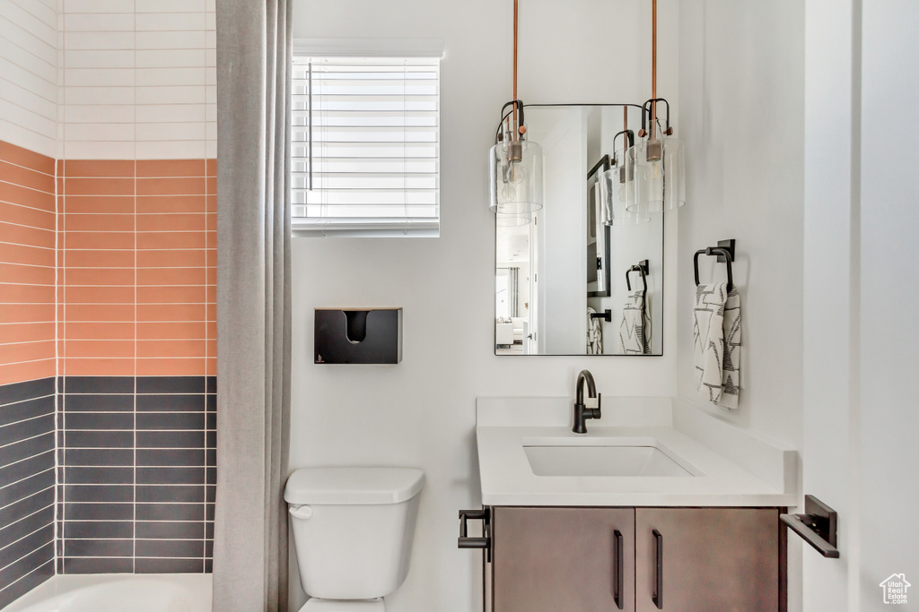 Bathroom featuring toilet and vanity