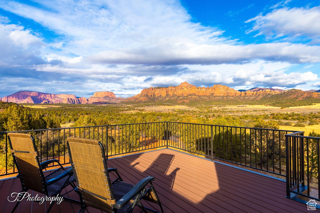 Wooden deck featuring a mountain view
