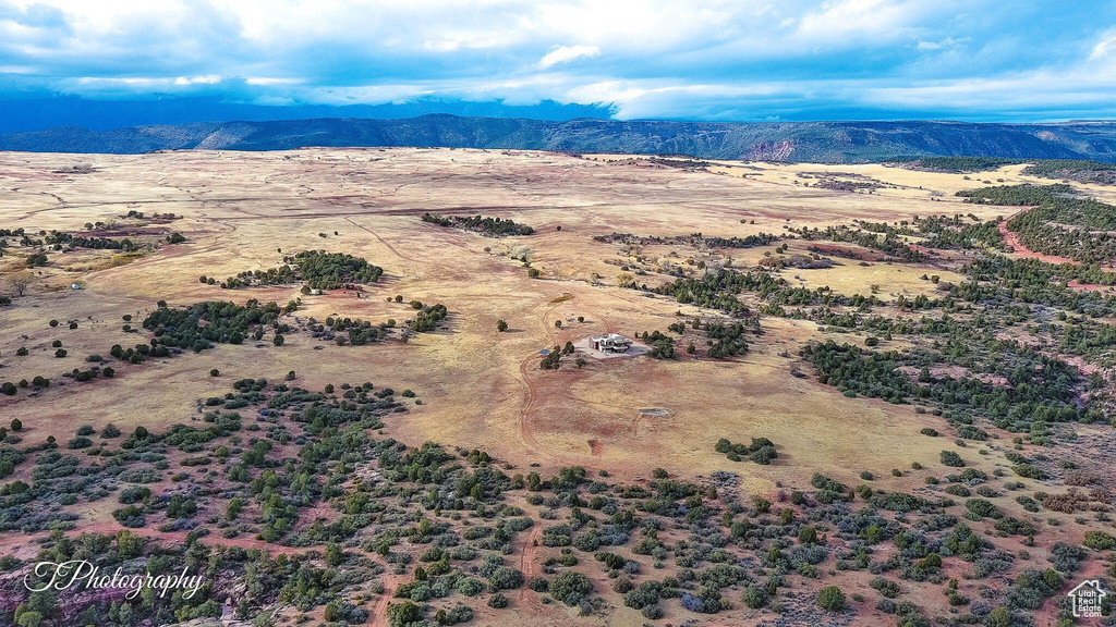 Drone / aerial view featuring a mountain view