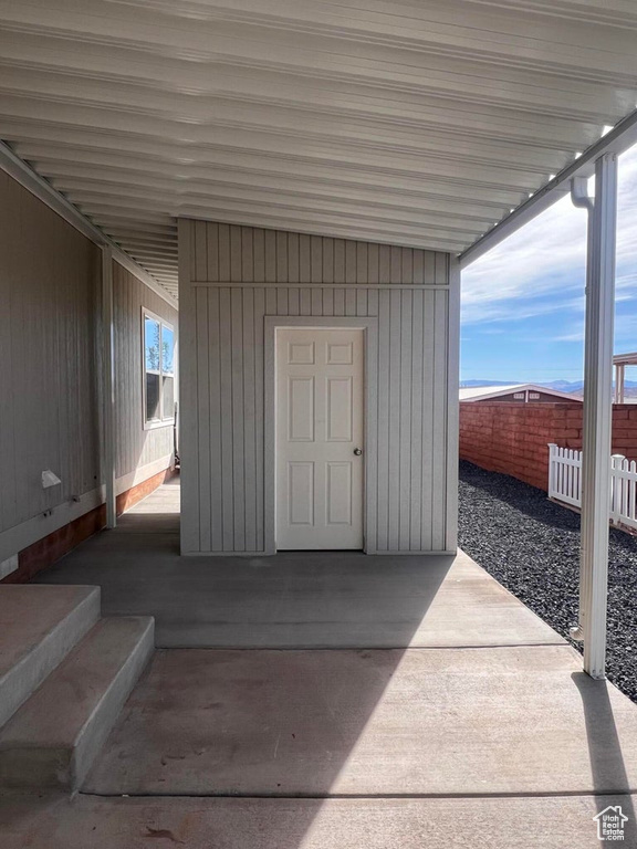 Exterior space with a carport