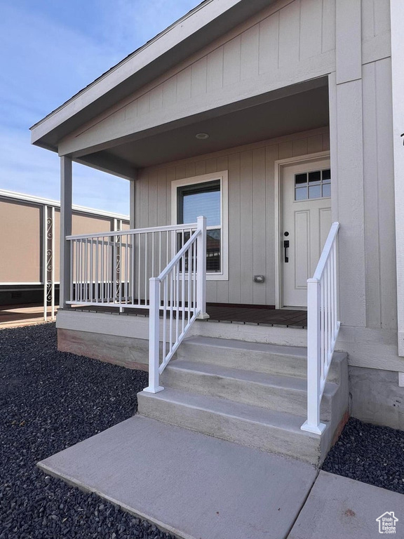 Entrance to property with a porch