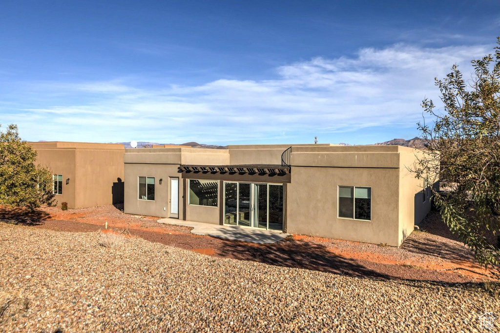 Rear view of house with a patio area