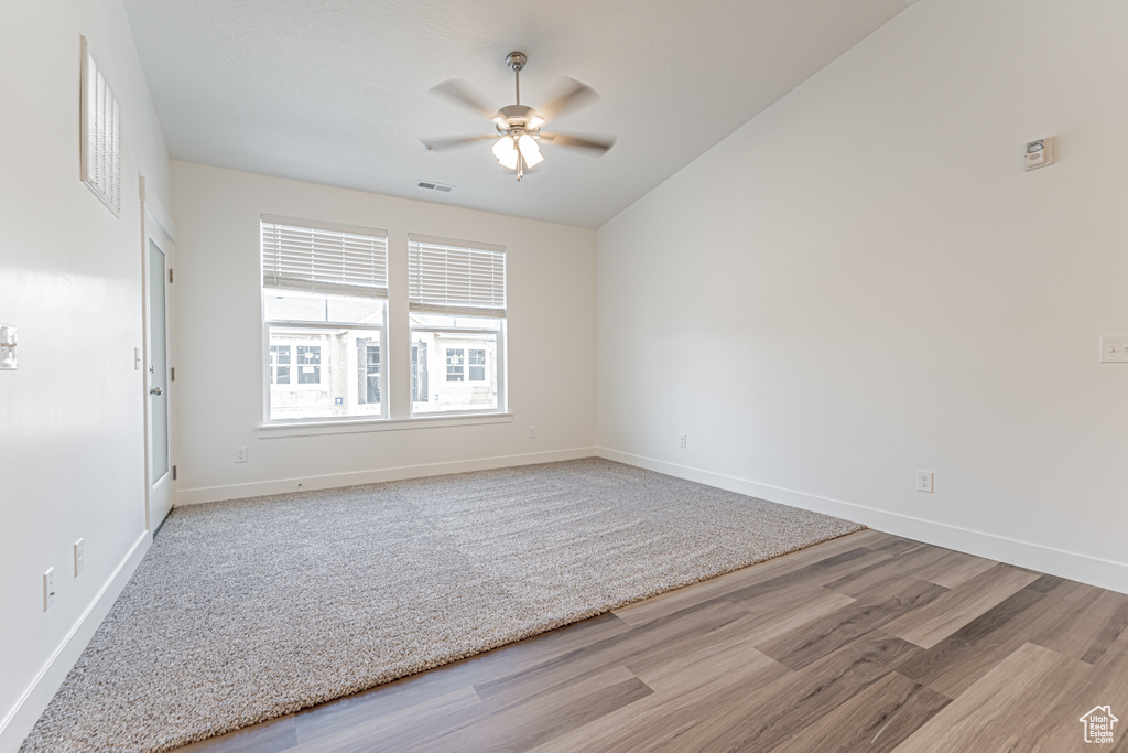 Unfurnished room with a ceiling fan and light wood finished floors