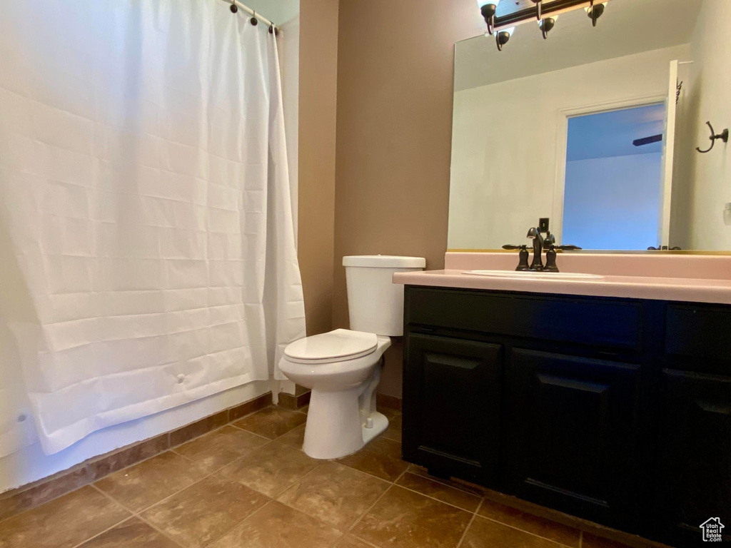 Bathroom with toilet and vanity