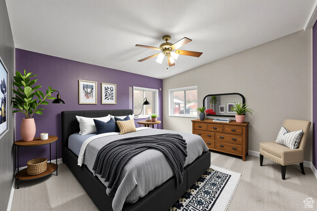 Bedroom featuring light colored carpet and a ceiling fan