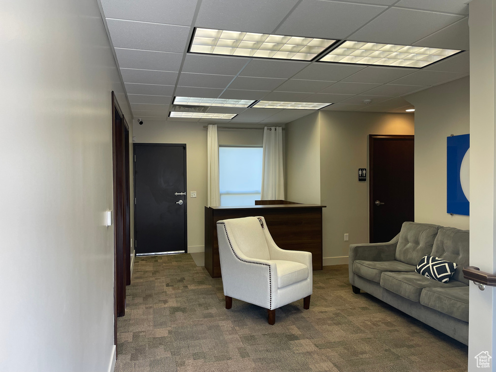 Interior space featuring a paneled ceiling