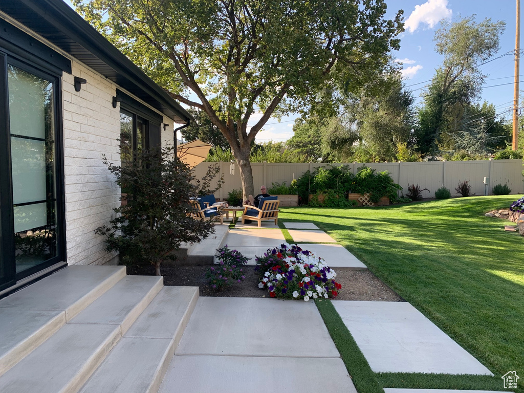 View of yard featuring a patio area