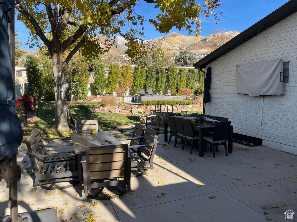 View of patio / terrace with a mountain view