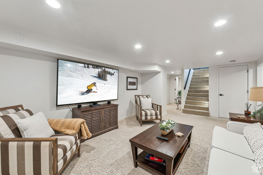 Living room featuring light colored carpet