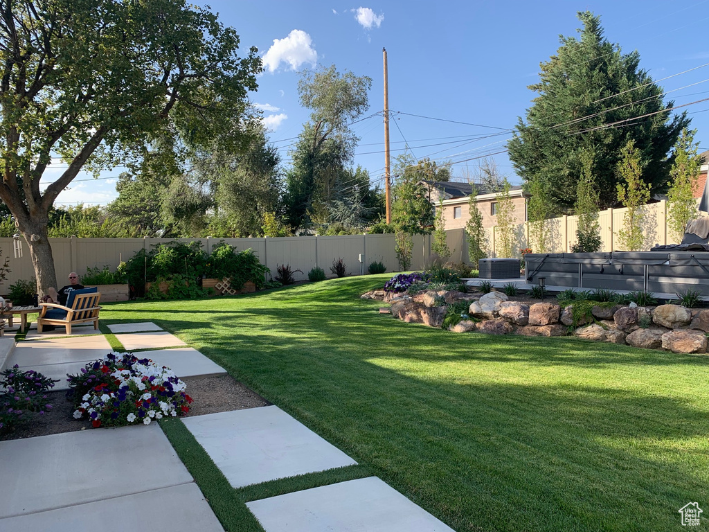 View of yard with a patio