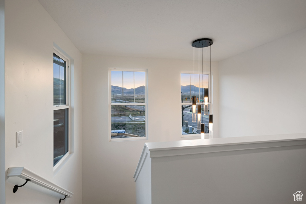 Unfurnished dining area featuring a mountain view