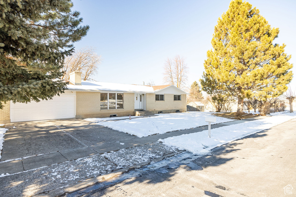 View of front of home with a garage