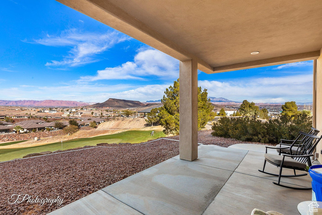 View of patio / terrace with a mountain view
