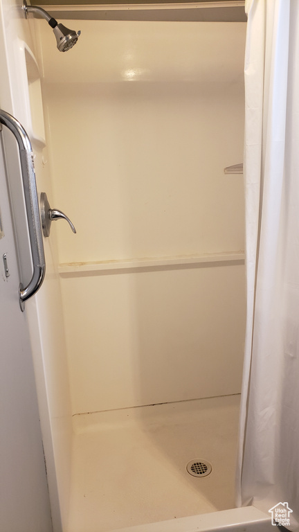 Bathroom with a shower stall