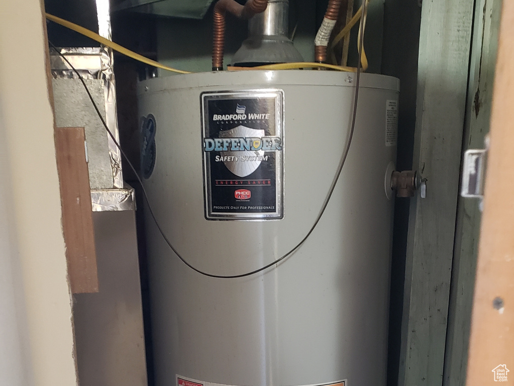 Utility room with gas water heater