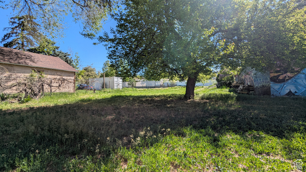 View of yard with fence