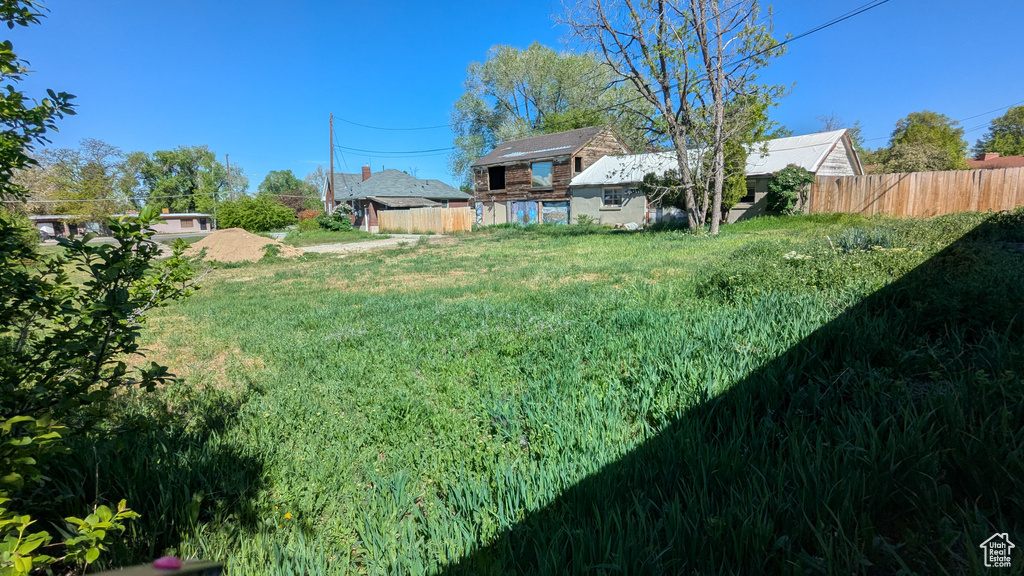 View of yard with fence