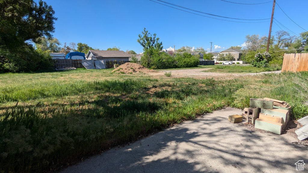 View of yard with fence