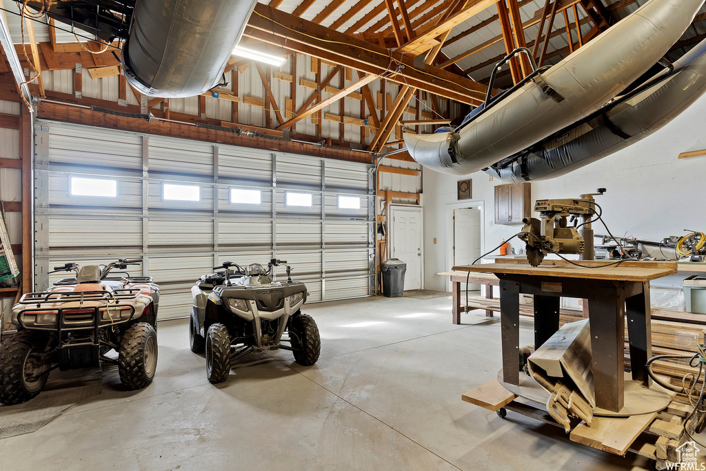 Garage featuring a workshop area