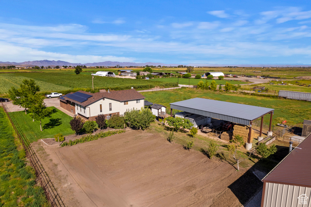 Birds eye view of property featuring a mountain view and a rural view