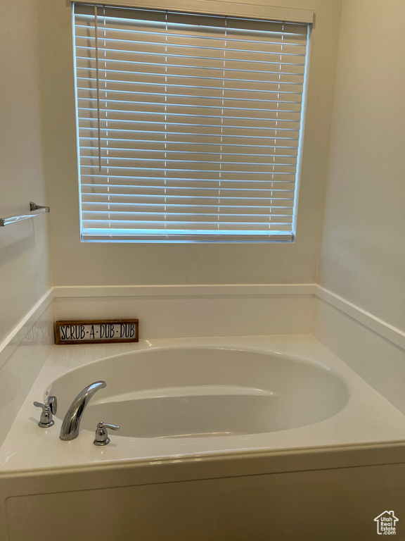 Bathroom featuring a tub