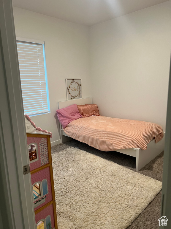 Bedroom featuring carpet