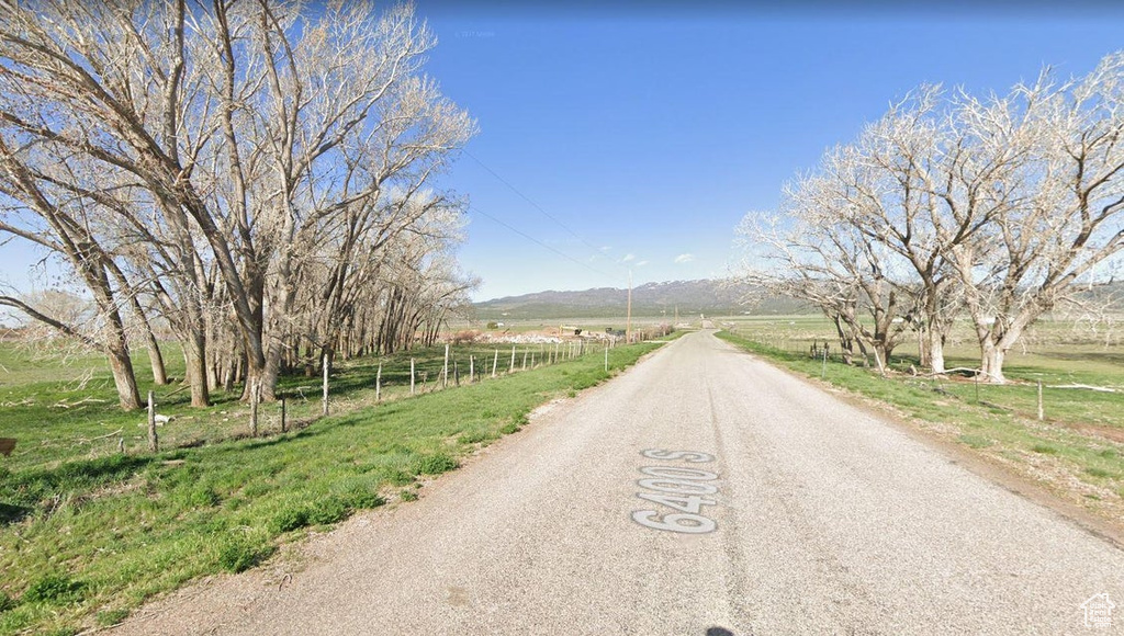 View of street featuring a mountain view and a rural view