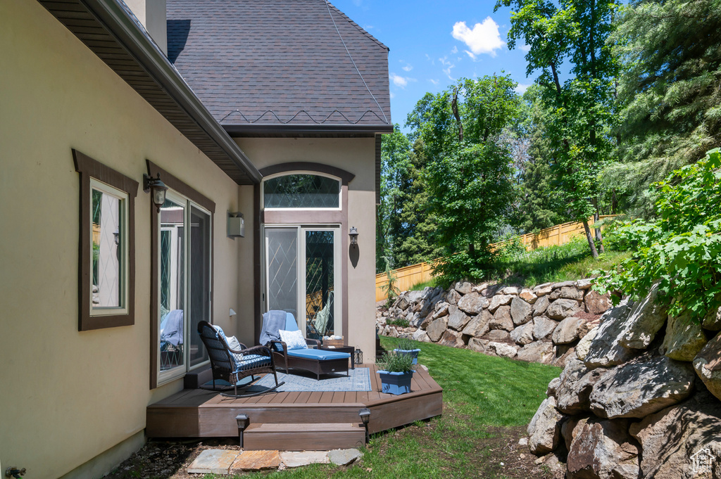 View of yard featuring a wooden deck