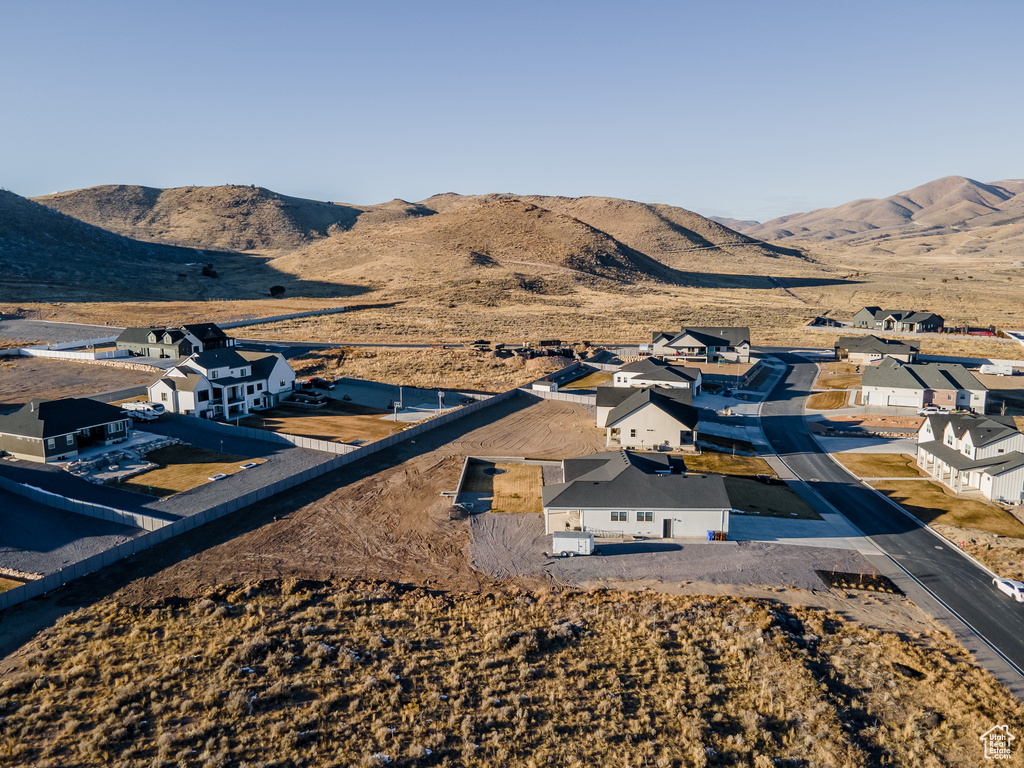 Birds eye view of property with a mountain view