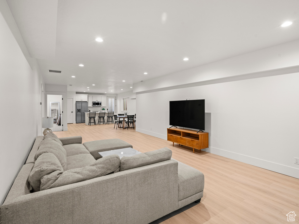 Living room featuring light hardwood / wood-style flooring