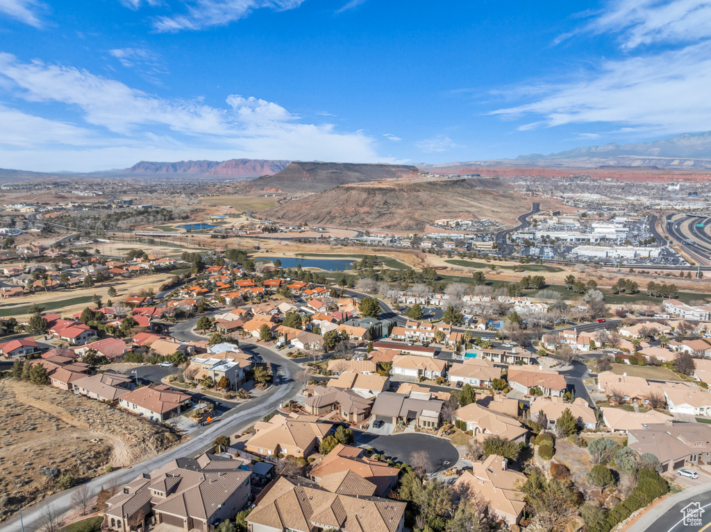 Birds eye view of property featuring a mountain view