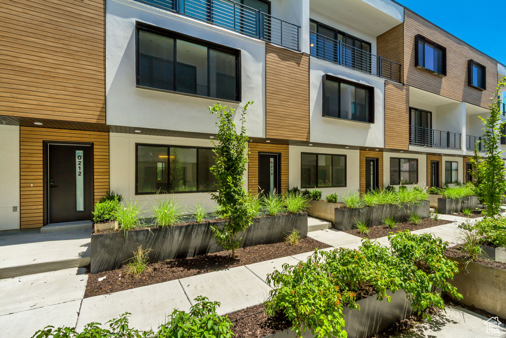 View of front of property featuring stucco siding