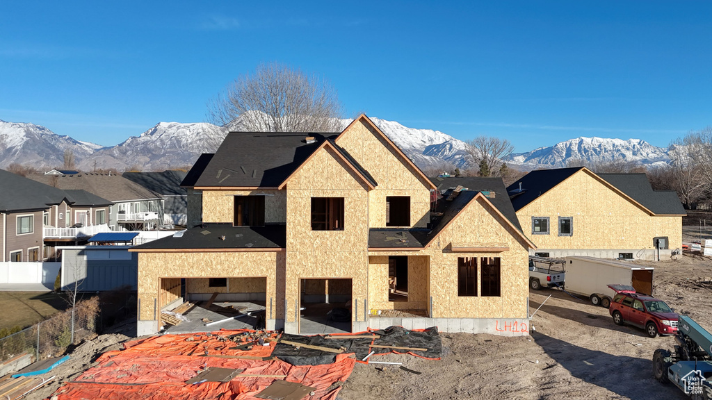 Property in mid-construction featuring a mountain view