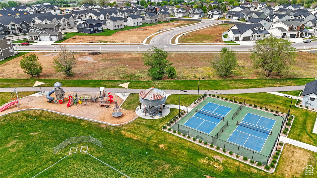 Birds eye view of property with a residential view