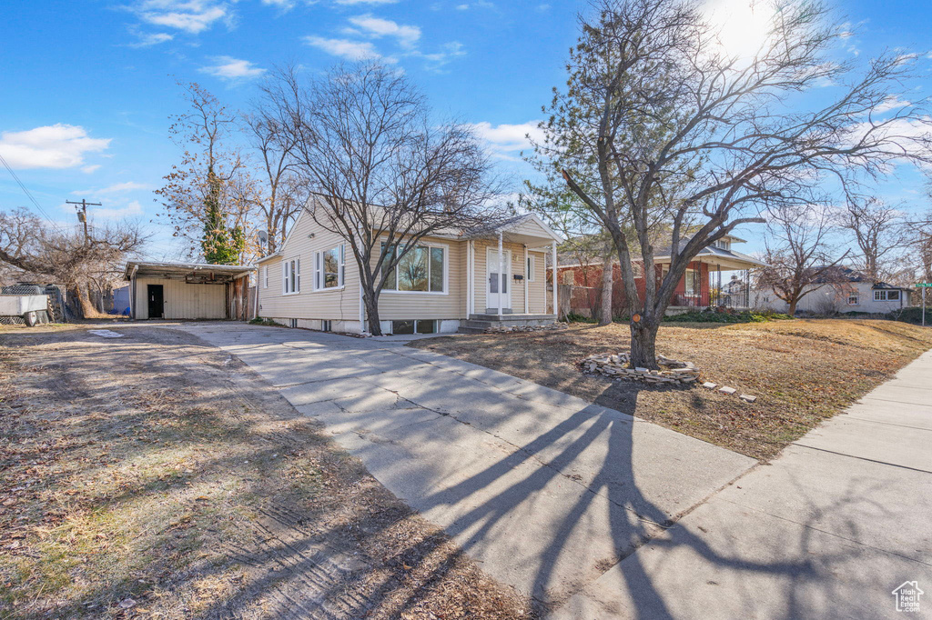 Ranch-style home with a carport