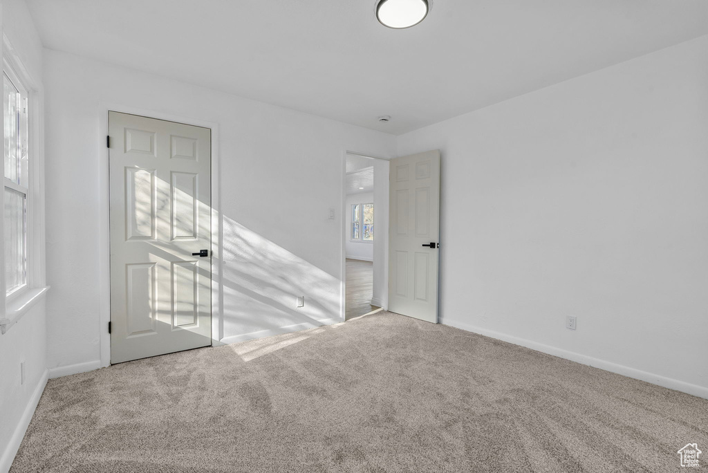 Spare room with light carpet