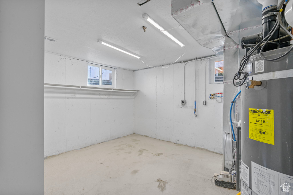 Basement featuring secured water heater