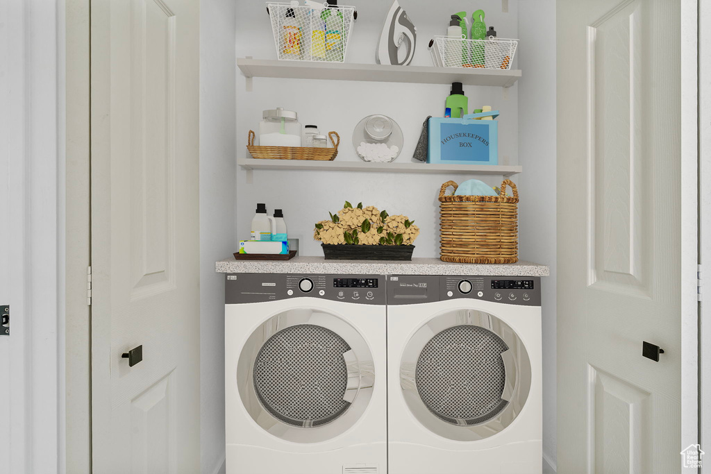 Clothes washing area with laundry area and washer and clothes dryer