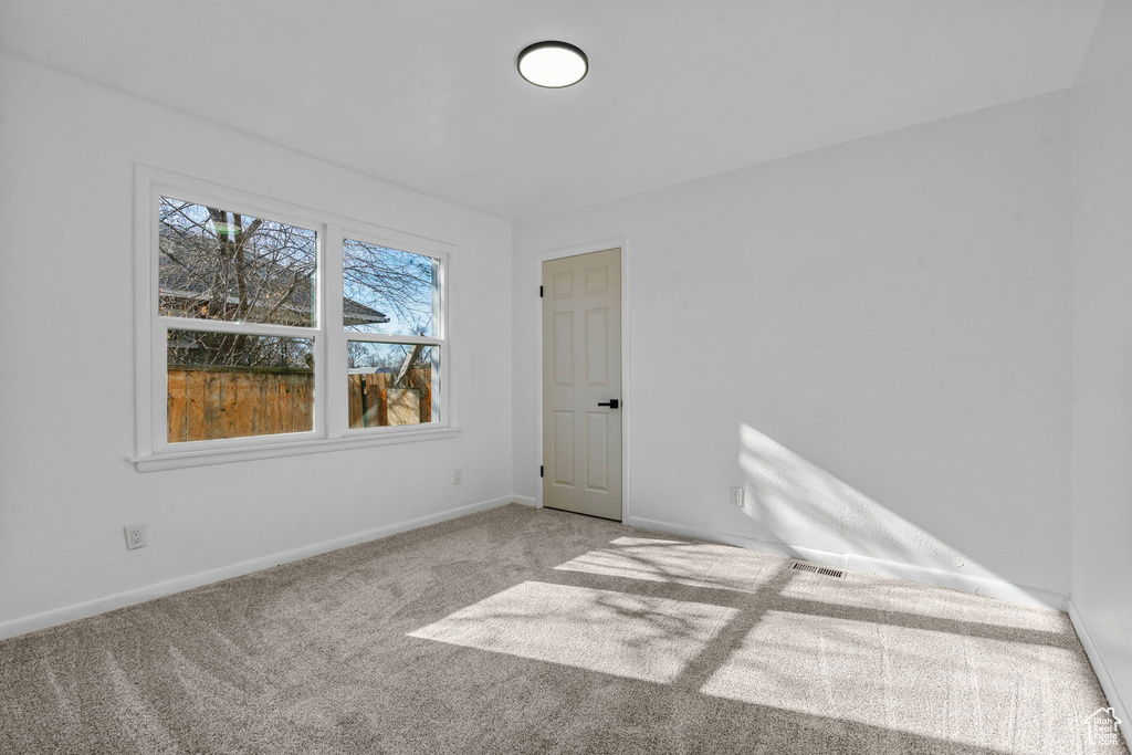 View of carpeted spare room