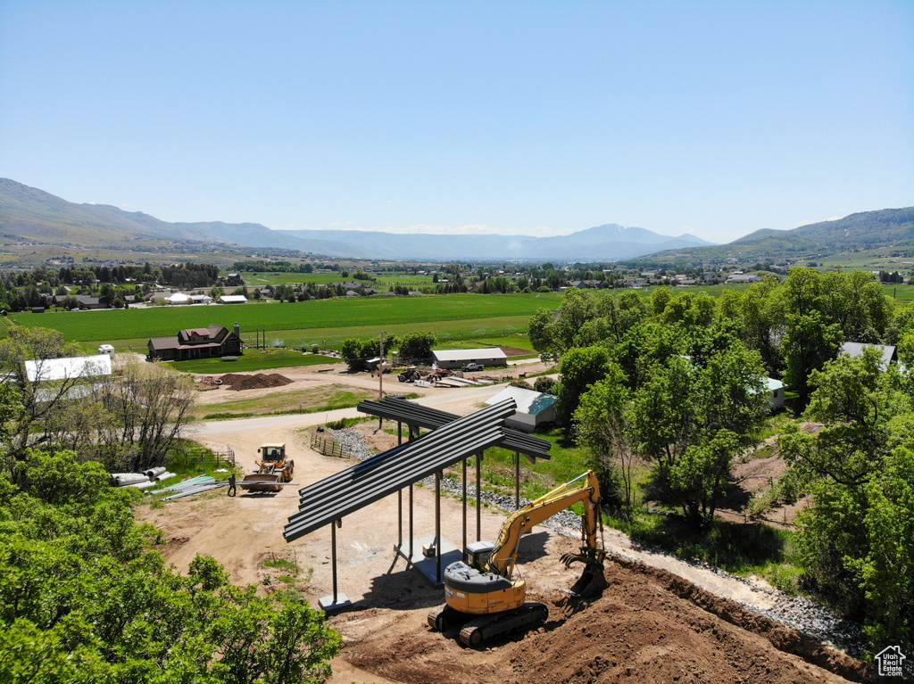 View of mountain backdrop featuring rural landscape
