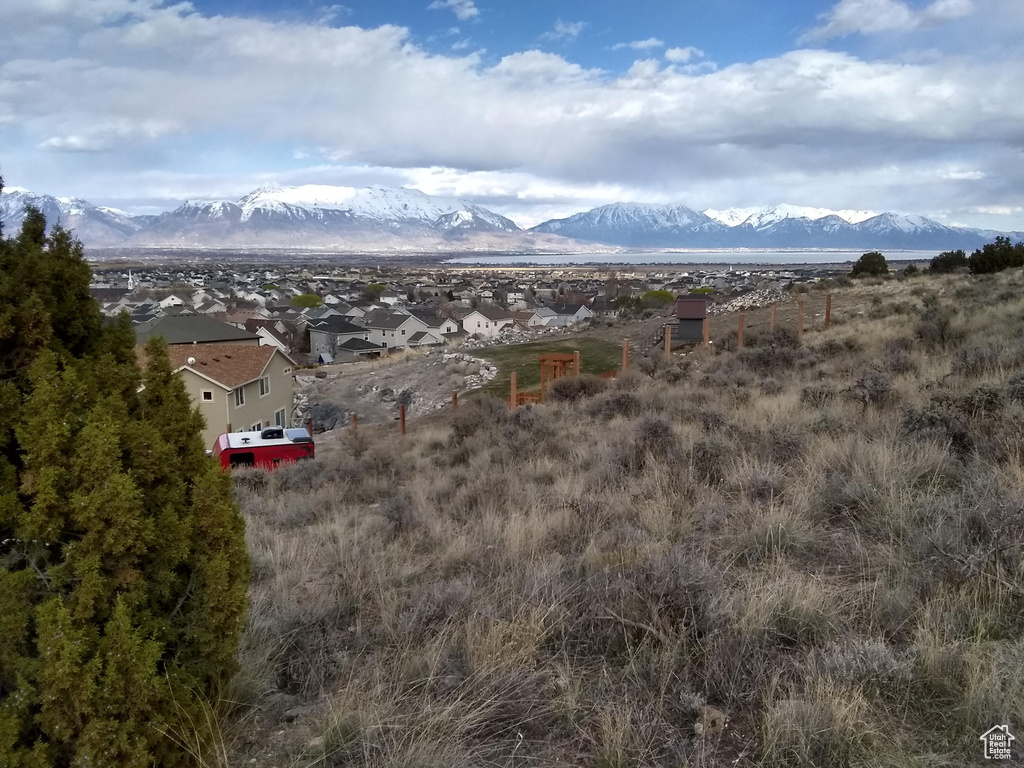 Property view of mountains featuring a residential view