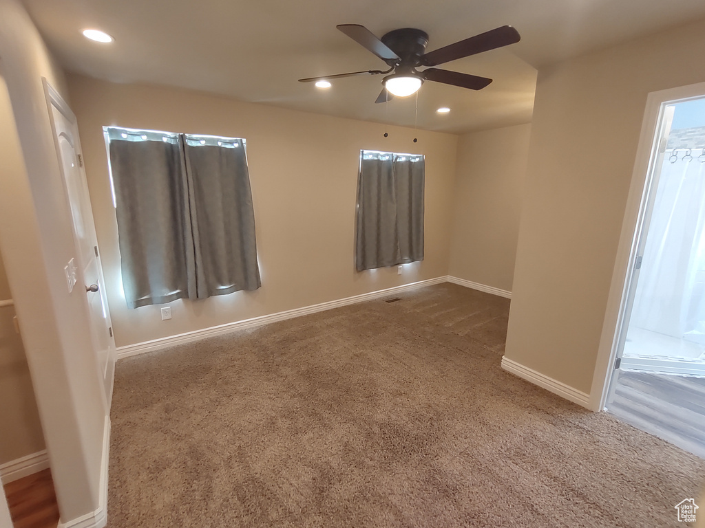 Empty room with recessed lighting, baseboards, ceiling fan, and carpet floors