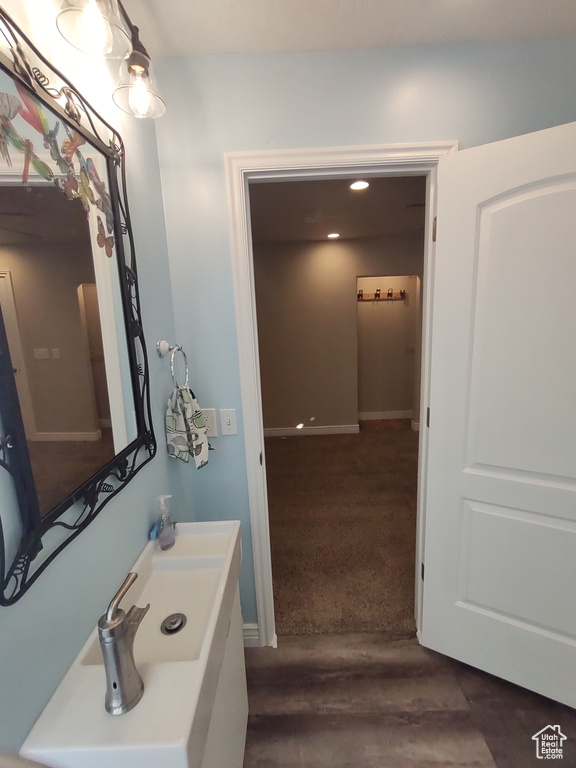 Bathroom with baseboards and a sink